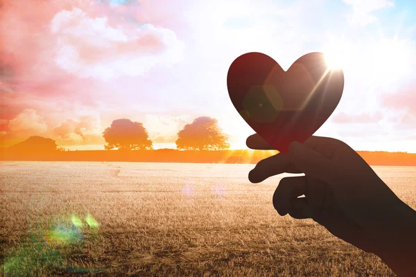 Heart against countryside scene — Stock Photo, Image