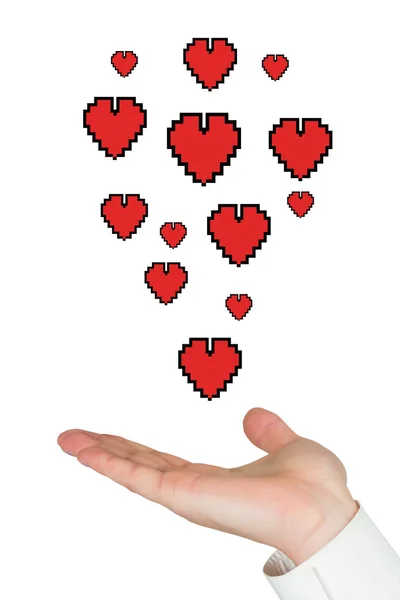 Hand presenting hearts — Stock Photo, Image