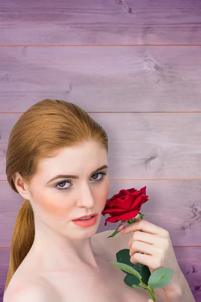 Redhead posing with red rose — Stock Photo, Image