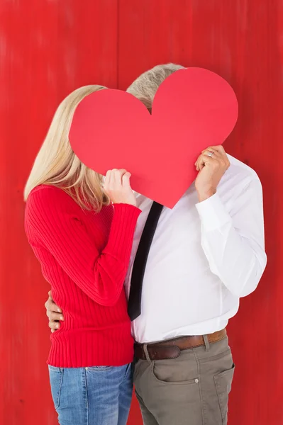 Man getting a heart card form wife — Stock Photo, Image