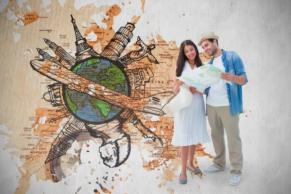 Hipster couple looking at map — Stock Photo, Image