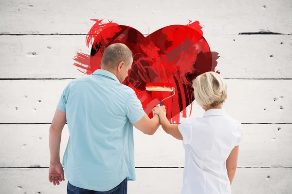 Couple painting white wall — Stock Photo, Image