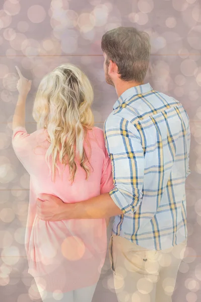 Attractive couple standing and looking — Stock Photo, Image