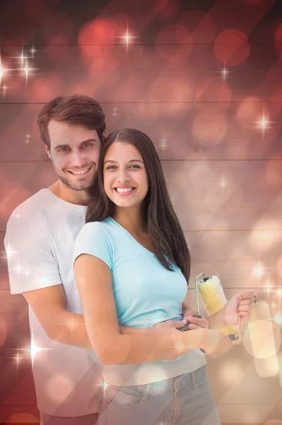 Happy young couple painting together — Stock Photo, Image