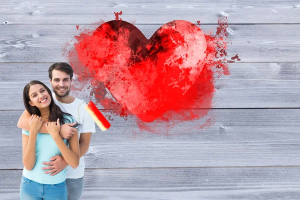 Couple painting heart together — Stock Photo, Image