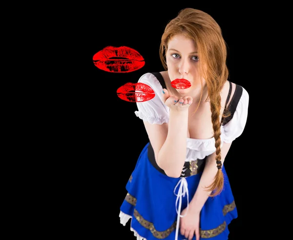 Oktoberfest meisje blaast een kus — Stockfoto