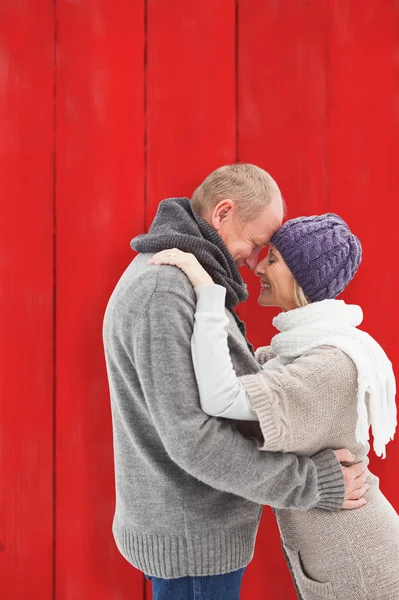 Happy mature couple in winter clothes — Stock Photo, Image