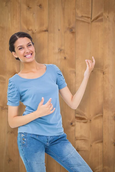 Pretty brunette playing air guitar — Stock Photo, Image