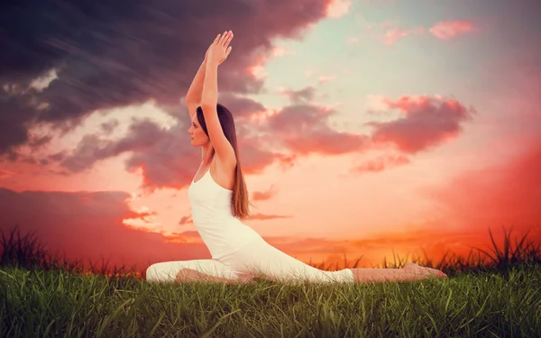 Woman with joined hands over head — Stock Photo, Image