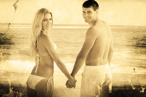 Rear view of couple holding hands — Stock Photo, Image