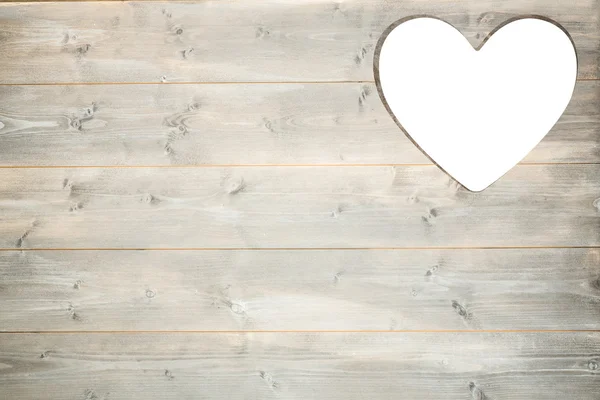 Heart cut out in wood — Stock Photo, Image