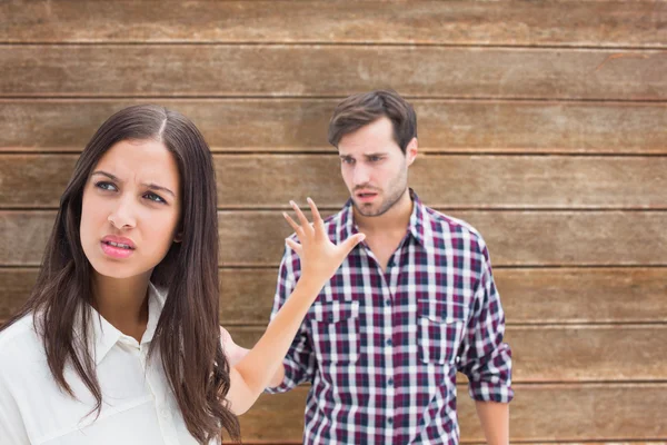 Angry brunette not listening to her boyfriend Royalty Free Stock Images