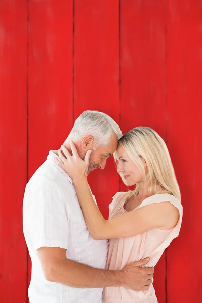 Affectionate couple standing and hugging — Stock Photo, Image