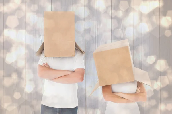 Couple wearing boxes over their heads — Stock Photo, Image