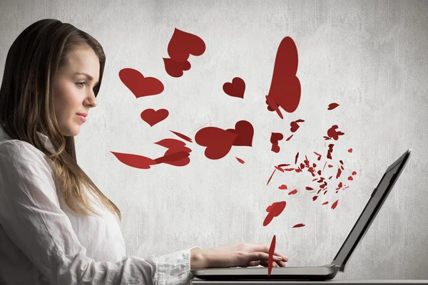 Businesswoman typing on her laptop — Stock Photo, Image