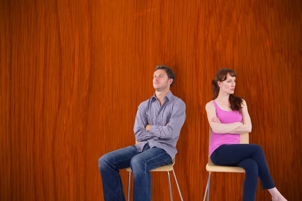 Sitting couple ignoring each other — Stock Photo, Image