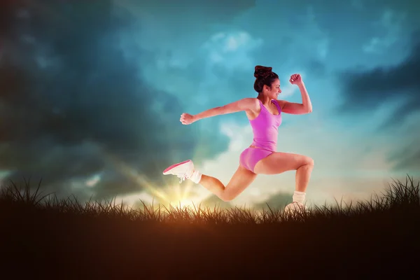 Brunette running and jumping — Stock Photo, Image