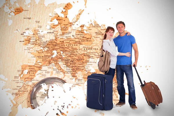 Couple going on holiday against world map — Stock Photo, Image