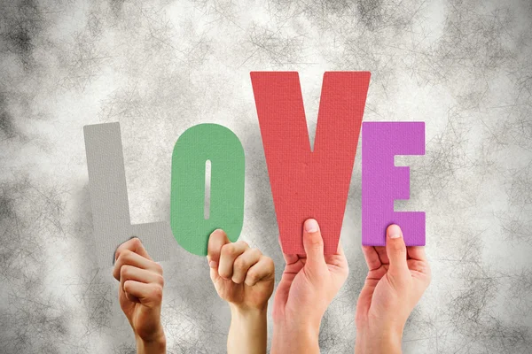 People holding word love — Stock Photo, Image