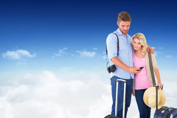 Attractive young couple ready to go on vacation — Stock Photo, Image