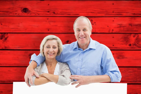 Mature couple smiling at camera — Stock Photo, Image