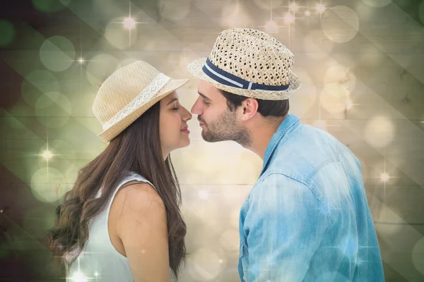 Happy hipster couple about to kiss — Stockfoto