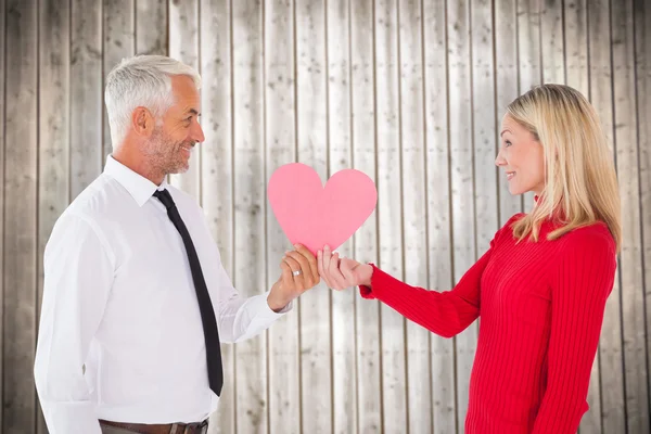 Man getting a heart card from wife — Stock Photo, Image