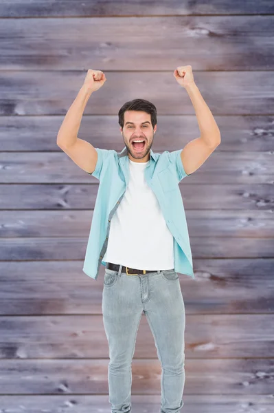 Happy casual man cheering at camera — Stock Photo, Image