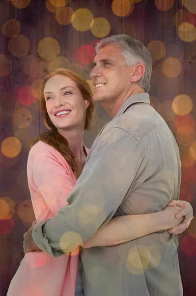 Casual couple hugging and smiling — Stock Photo, Image