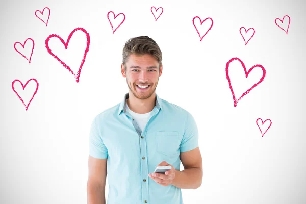 Hombre joven usando su teléfono inteligente —  Fotos de Stock