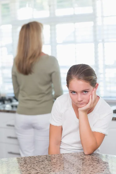 Sulking little girl looking at camera — Stock Photo, Image