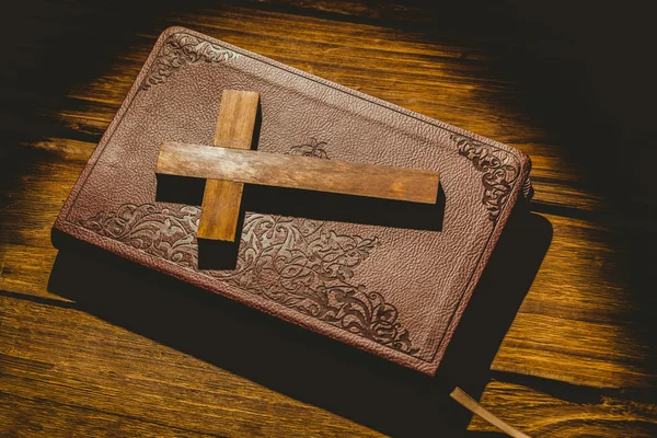 Crucifix icon on the bible — Stock Photo, Image