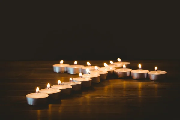 Velas en forma de cruz — Foto de Stock