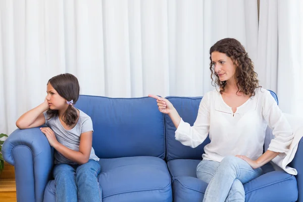 Upset mother looking at her daughter — Stock Photo, Image