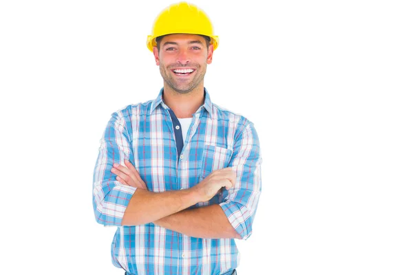 Smiling handyman standing arms crossed — Stock Photo, Image