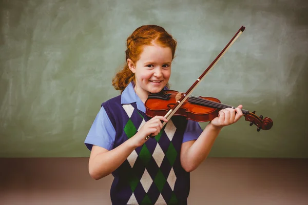 Cute little girl playing violin in classroom — Stock Photo, Image