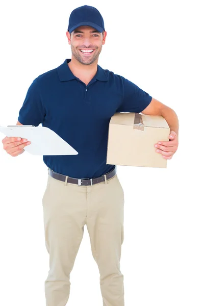 Delivery man with cardboard box and clipboard — Stock Photo, Image