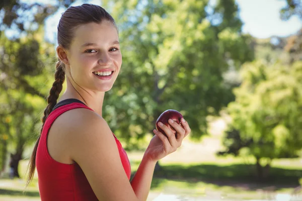 Woman holding bag of healthy groceries — Stock Photo, Image