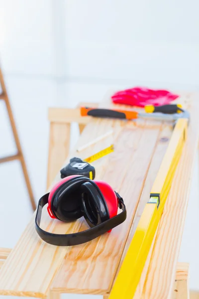 Construction tools on workbench — Stock Photo, Image