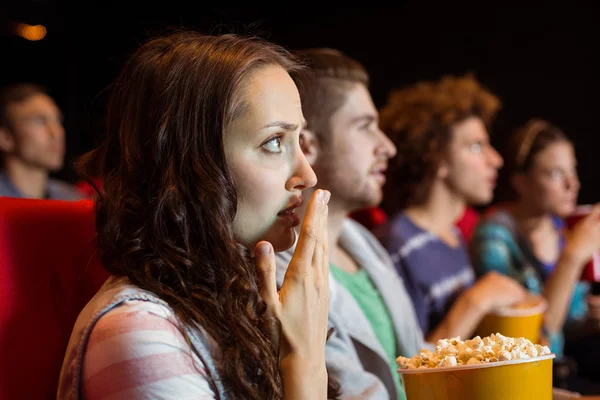 Young friends watching a film — Stock Photo, Image