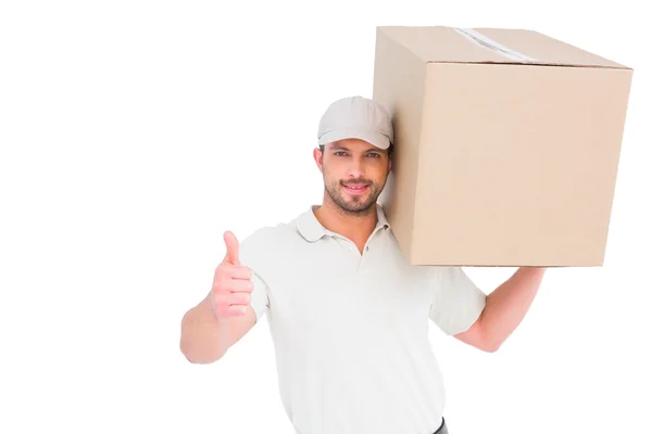 Delivery man gesturing thumbs up — Stock Photo, Image