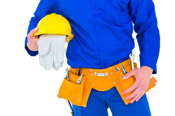 Handyman che tiene il casco — Foto Stock