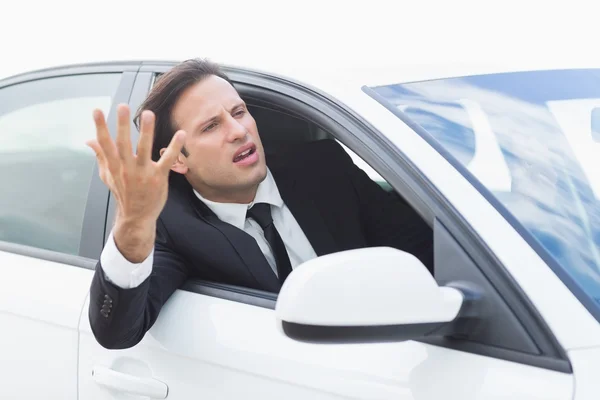 Homme d'affaires éprouvant la rage de la route — Photo