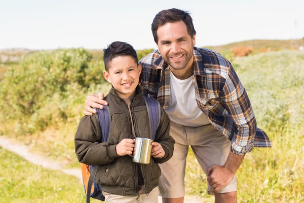 Father and son hiking in the mountains — Stock Photo, Image