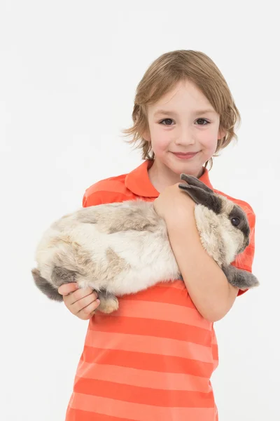 Cute boy holding bunny — Stock Photo, Image