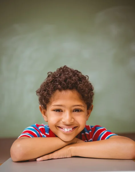 Little boy smiling in classroom — Stock Photo, Image