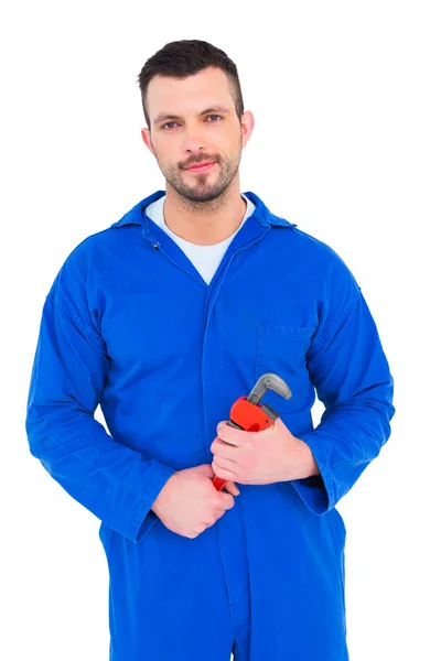 Male mechanic holding monkey wrench — Stock Photo, Image