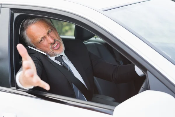 Homme d'affaires éprouvant la rage de la route — Photo