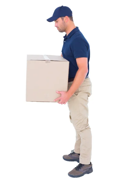 Delivery man carrying cardboard box — Stock Photo, Image