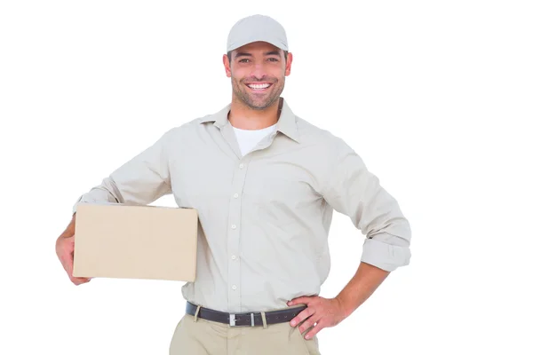 Confident delivery man with cardboard box — Stock Photo, Image